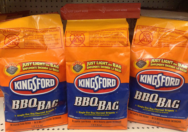 Three bags of Kingsford charcoal