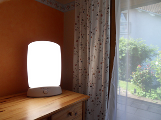 A photograph shows a bright lamp.