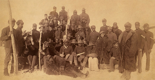 A photograph shows a posed group of uniformed “Buffalo Soldiers.”