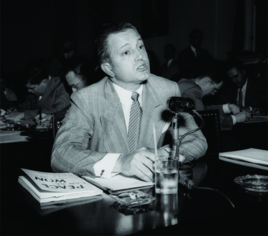 A photograph shows Edward Dmytryk testifying before the House Committee on Un-American Activities.