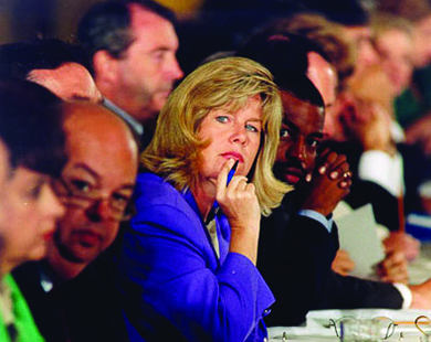 A photograph shows Tipper Gore seated at a table at a Senate hearing.