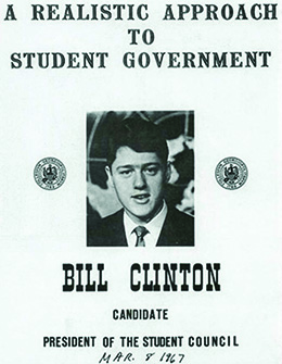 A poster featuring a photograph of a college-age Bill Clinton reads “A Realistic Approach to Student Government / Bill Clinton / Candidate / President of the Student Council.” Hand-lettered at the bottom is the date “Mar. 8 1967.”